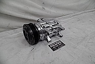 Aluminum AC Compressor AFTER Chrome-Like Metal Polishing - Aluminum Polishing Services