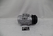 Aluminum AC Compressor BEFORE Chrome-Like Metal Polishing - Aluminum Polishing Services