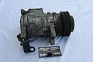 Ford Mustang Aluminum V8 AC Compressor BEFORE Chrome-Like Metal Polishing and Buffing Services