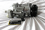 Ford Mustang Aluminum V8 AC Compressor BEFORE Chrome-Like Metal Polishing and Buffing Services