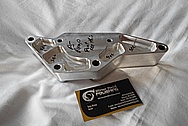 Aluminum Power Steering Pump Bracket BEFORE Chrome-Like Metal Polishing and Buffing Services / Restoration Service