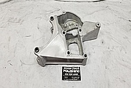 Aluminum Alternator Bracket BEFORE Chrome-Like Metal Polishing and Buffing Services - Aluminum Polishing