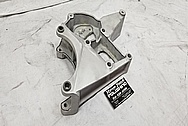 Aluminum Alternator Bracket BEFORE Chrome-Like Metal Polishing and Buffing Services - Aluminum Polishing