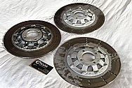 Harley Davidson Aluminum Brake Rotor Centers BEFORE Chrome-Like Metal Polishing and Buffing Services / Restoration Services