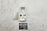Nintendo Gameboy Aluminum Cover BEFORE Chrome-Like Metal Polishing and Buffing Services / Restoration Services - Aluminum Polishing 