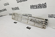 Aluminum Grille BEFORE Chrome-Like Metal Polishing and Buffing Services - Aluminum Polishing Service