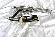 Magnum Research DE 44 Mag Stainless Steel Gun Frame, Slide, Barrel, Sights, Safeties, Slide Stop, Hammer, Take Down Release, Magazine Catch, Pins and Screws AFTER Chrome-Like Metal Polishing and Buffing Services