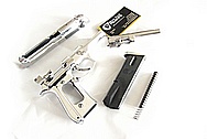 Beretta Stainless Steel Gun Slide, Hammer, Trigger, Frame, Barrel and Magazine AFTER Chrome-Like Metal Polishing and Buffing Services