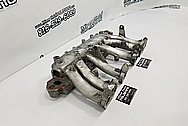 Aluminum 6 Cylinder Intake Manifold BEFORE Chrome-Like Metal Polishing and Buffing Services - Aluminum Polishing