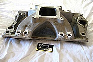 Aluminum V8 Intake Manifold BEFORE Chrome-Like Metal Polishing and Buffing Services Plus Painting Services
