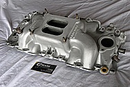 Aluminum GM V8 Intake Manifold BEFORE Chrome-Like Metal Polishing and Buffing Services Plus Painting Services