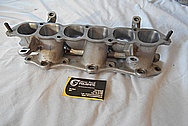 Mitsubishi 3000 GT Twin Turbo Aluminum Lower Intake Manifold BEFORE Chrome-Like Metal Polishing and Buffing Services / Restoration Services