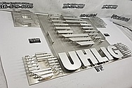 UHLIG Stainless Steel Sign Art BEFORE Chrome-Like Metal Polishing and Buffing Services / Restoration Services - Aluminum Polishing