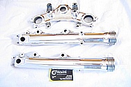 Motorcycle Aluminum Triple Tree and Lower Shock Arms AFTER Chrome-Like Metal Polishing and Buffing Services