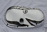 AFTER PHOTO OF TRIUMPH MOTORCYCLE COVER PIECE AFTER CHROME POLISHING TO A MIRROR FINISH!
