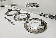 Aluminum and Steel Motorcycle Brake Rotors AFTER Chrome-Like Metal Polishing and Buffing Services / Restoration Services