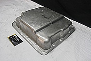 Aluminum Transmission Oil Pan BEFORE Chrome-Like Metal Polishing and Buffing Services / Restoration Services