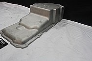 Aluminum Engine Oil Pan BEFORE Chrome-Like Metal Polishing and Buffing Services / Restoration Services