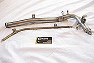 2009 Mitsubishi EVO 9 Aluminum Piping BEFORE Chrome-Like Metal Polishing and Buffing Services