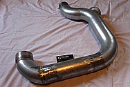 Ford Mustang Aluminum Engine Pipe AND Flange BEFORE Chrome-Like Metal Polishing and Buffing Services