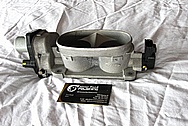 2007 Ford Mustang Aluminum Throttle Body BEFORE Chrome-Like Metal Polishing and Buffing Services
