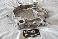Aluminum Timing Cover BEFORE Chrome-Like Metal Polishing and Buffing Services / Restoration Services 