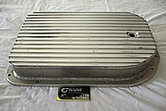 Aluminum Transmission Pan BEFORE Chrome-Like Metal Polishing and Buffing Services