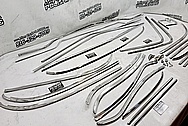 1965 Ford Mustang Stainless Steel Trim Pieces AFTER Chrome-Like Metal Polishing and Buffing Services / Restoration Services - Steel Polishing - Trim Polishing