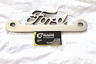 Aluminum Ford Emblem Trim Piece AFTER Chrome-Like Metal Polishing and Buffing Services