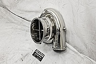 On 3 Performance Aluminum Turbo Housing AFTER Chrome-Like Metal Polishing and Buffing Services - Aluminum Polishing