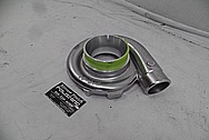 On 3 Performance Aluminum Turbo Housing BEFORE Chrome-Like Metal Polishing and Buffing Services - Aluminum Polishing