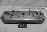 Isuzu Aluminum Valve Cover BEFORE Chrome-Like Metal Polishing and Buffing Services - Aluminum Polishing Services 