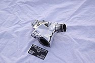 Mazda RX-7 Aluminum Water Pump Piece AFTER Chrome-Like Metal Polishing and Buffing Services