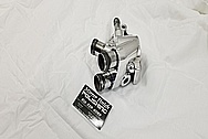 Aluminum Water Pump Distribution Block and Thermostat Housing AFTER Chrome-Like Metal Polishing and Buffing Services - Aluminum Polishing Services