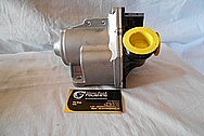 Aluminum Water Pump BEFORE Chrome-Like Metal Polishing and Buffing Services / Restoration Services