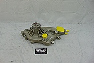 GM Aluminum Water Pump BEFORE Chrome-Like Metal Polishing and Buffing Services - Aluminum Polishing Services 