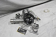 Aluminum Water Pump & Pulley BEFORE Chrome-Like Metal Polishing and Buffing Services / Restoration Services 