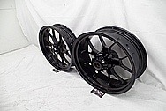 Intricate Aluminum Black Coated Motorcycle Wheels BEFORE Chrome-Like Metal Polishing and Buffing Services - Aluminum Polishing