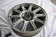 Subaru WRX STI Aluminum 17" Wheel BEFORE Chrome-Like Metal Polishing and Buffing Services