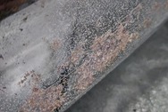 Lincoln Steel Bumper BEFORE Chrome-Like Metal Polishing and Buffing Services | Steel Polishing Services