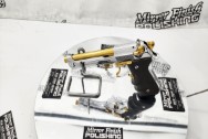 Stainless Steel Beretta 92FS Gun | Pistol AFTER Chrome-Like Metal Polishing and Buffing Services | Gun Polishing Services Plus the Gold Look on Accent Pieces