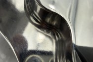 Harley Davidson M8 Transmission Trap Door BEFORE Chrome-Like Metal Polishing and Buffing Services | Restoration Services | Harley Davidson Polishing Services