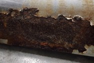 Lincoln Steel Bumper BEFORE Chrome-Like Metal Polishing and Buffing Services|Steel Polishing Services