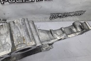 Aluminum Engine Timing Cover BEFORE Chrome-Like Metal Polishing and Buffing Services | Aluminum Polishing